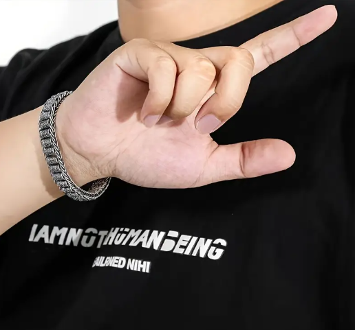 PATHFINDER Bracelet worn on wrist, highlighting masculine design and engraved mantra detail