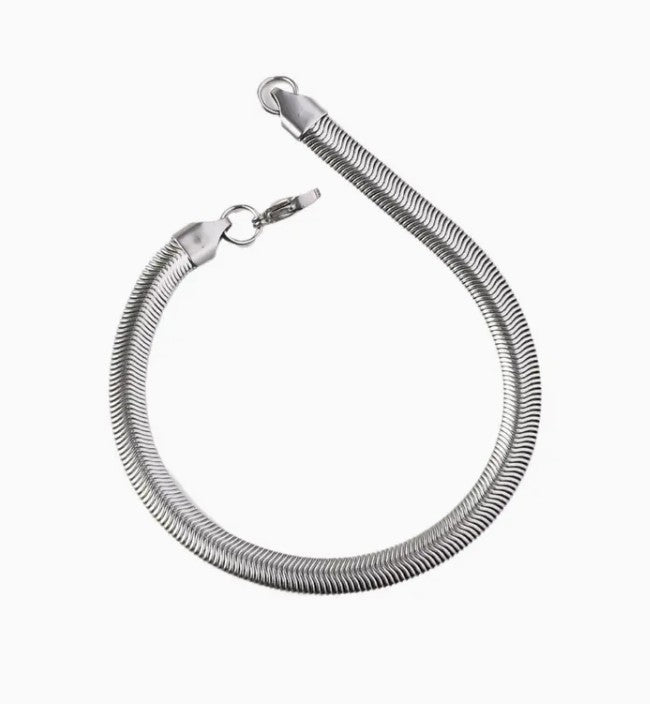 SARP Flat Snake Chain Bracelet shown in coiled position with secure clasp and fluid stainless steel construction