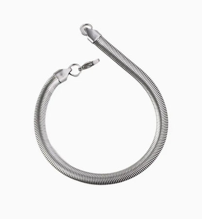 SARP Flat Snake Chain Bracelet shown in coiled position with secure clasp and fluid stainless steel construction
