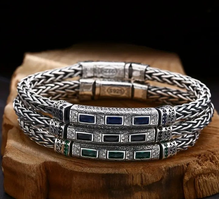 BRAZEN Bracelet with deep black zirconia stone and rugged braided chain design, highlighting retro-modern aesthetic