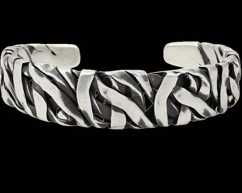 Detailed view of STRIKE Cuff Bracelet with rugged striped metalwork and open-ended silver band