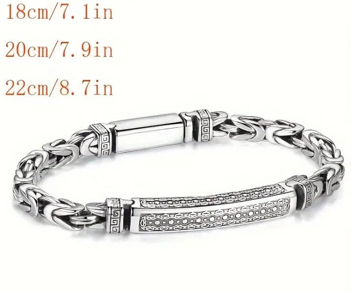 KIEL Bracelet laid flat, highlighting detailed Byzantine chain texture and engraved centerpiece