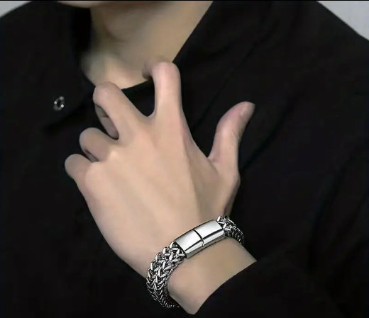 STRATUM Bracelet worn on wrist, showcasing clean chain-link design and magnetic clasp