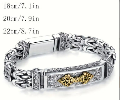 Close-up of WISDOM Bracelet’s engraved crest and intricate chain-link craftsmanship